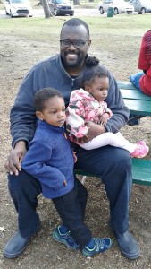 Conover enjoys an afternoon at the park with his son and daughter.