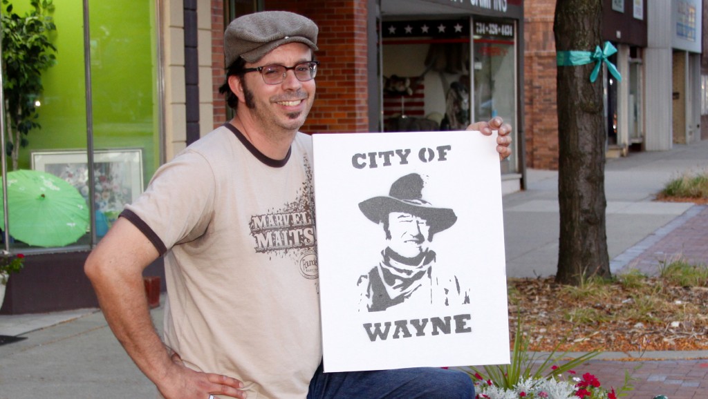 The artist behind the mysterious John Wayne posters over the past two years, Matt Rochon.