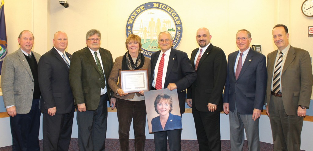 The Wayne City Council take one last picture with retiring Councilwoman Pam  Dobrowolski pictured from left to right, Albert Damitio, Jim Henley, Skip Monet, Pam Dobrowolski, Mayor Al Haidous, John Rhaesa, Jim Hawley and Acting City Manager Ramzi Elbrib. Photo by Jenny Johnson