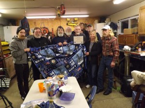 Dave (center holding certificate) and his family (sons Matt, far left and Rob (not pictured), and ex-wife Janet (back right)), welcomed Navy buddies, Keith Hurley, Jimmy Kernels, Mike Kelly, Bear Kemnets, Bob McAllister, Marty Martin, Bobby Piriak, John Potts, Bill Anderkin, Rick Phillips and their families.  