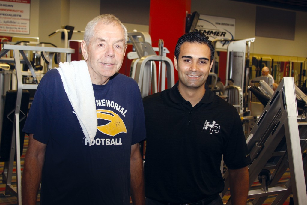 Long time recreation member Ron Hays is takes a break from his workout to take a picture with CEO of HYPE Athletics, Ali Sayed. Wayne Dispatch photo by John P. Rhaesa