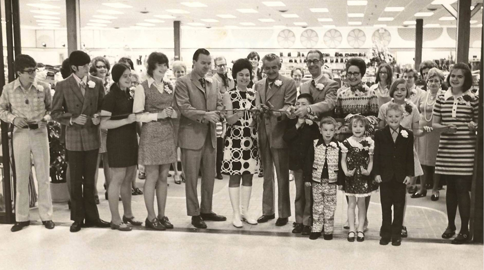 Ribbon cutting at the new Metro Mall location in 1970 with Mayor Pat Norton, Mr. and Mrs. James Collins (General Manager) and the Mulholland family.