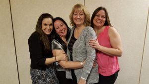 Debbie Cowell (in grey sweater) is surrounded by her children Lindsay Cowell, Dana Cowell and April Cowell.