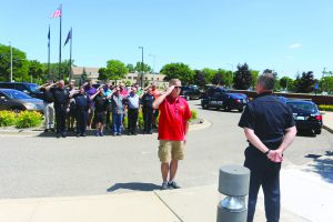 The Wayne Police salute newly retired Police Officer Lt. Puckett last month.