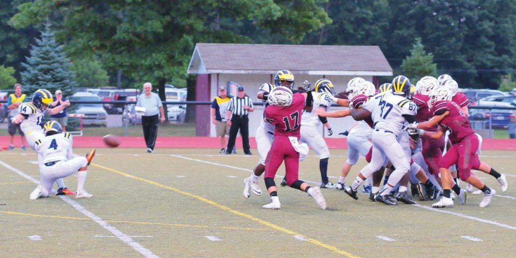 Senior Gillian Abicht kicks an extra point for Wayne Memorial High School. 